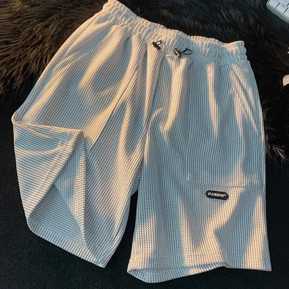 Summer Men's Large Size Sports Suit Breathable Casual Wear Wild High Street Chic Fake Two-piece Casual T-shirt + Simple Shorts